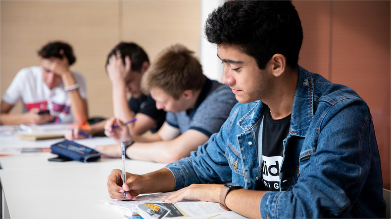 EF Students completing exercises