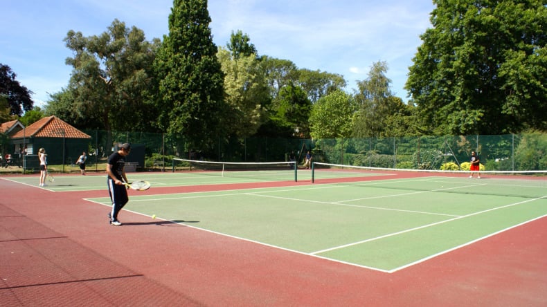 Playing tennis